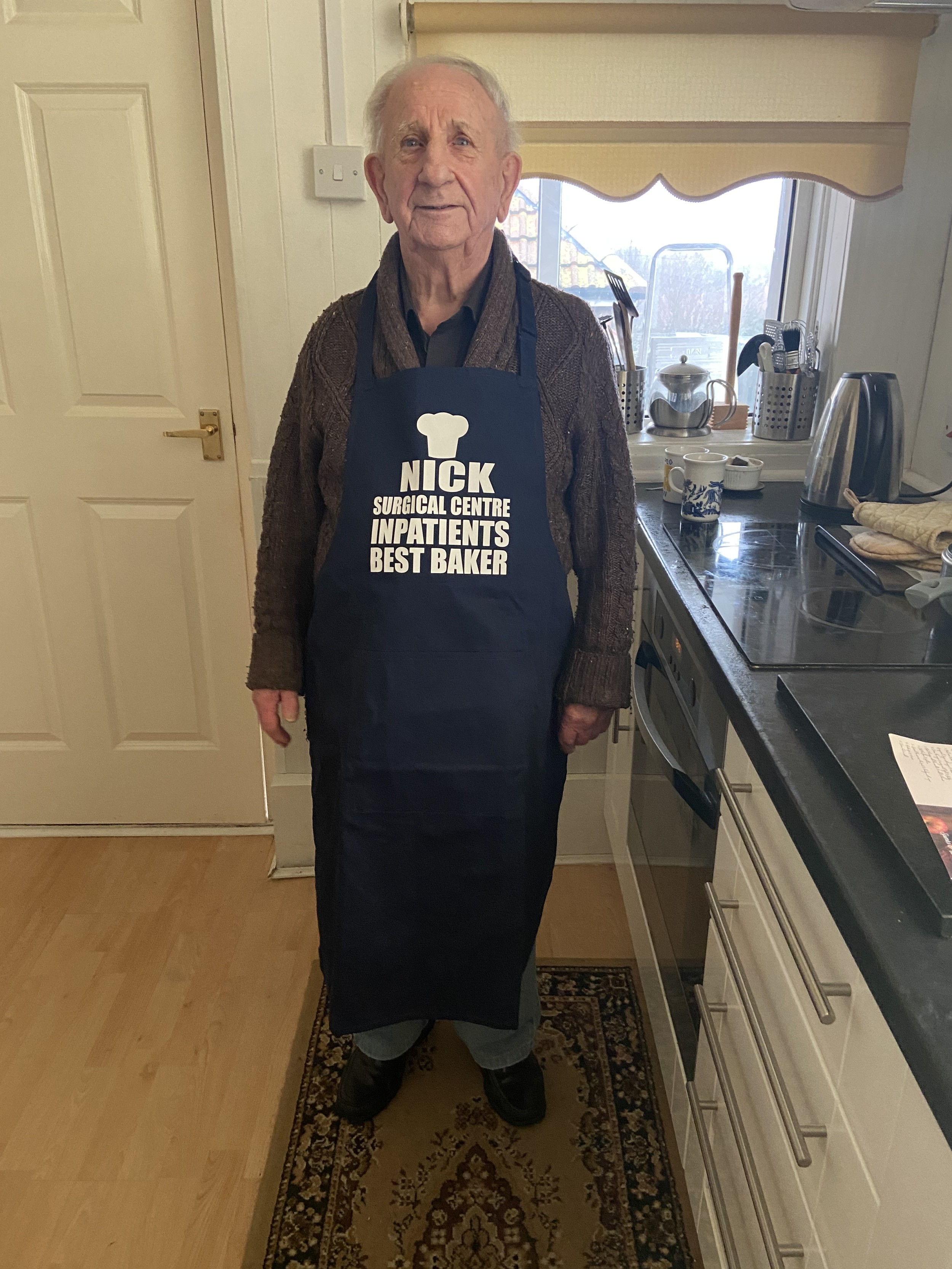 Nick Cunningham wearing the apron his friends at South Tyneside District Hospital's SCIP ward gifted to him..jpg