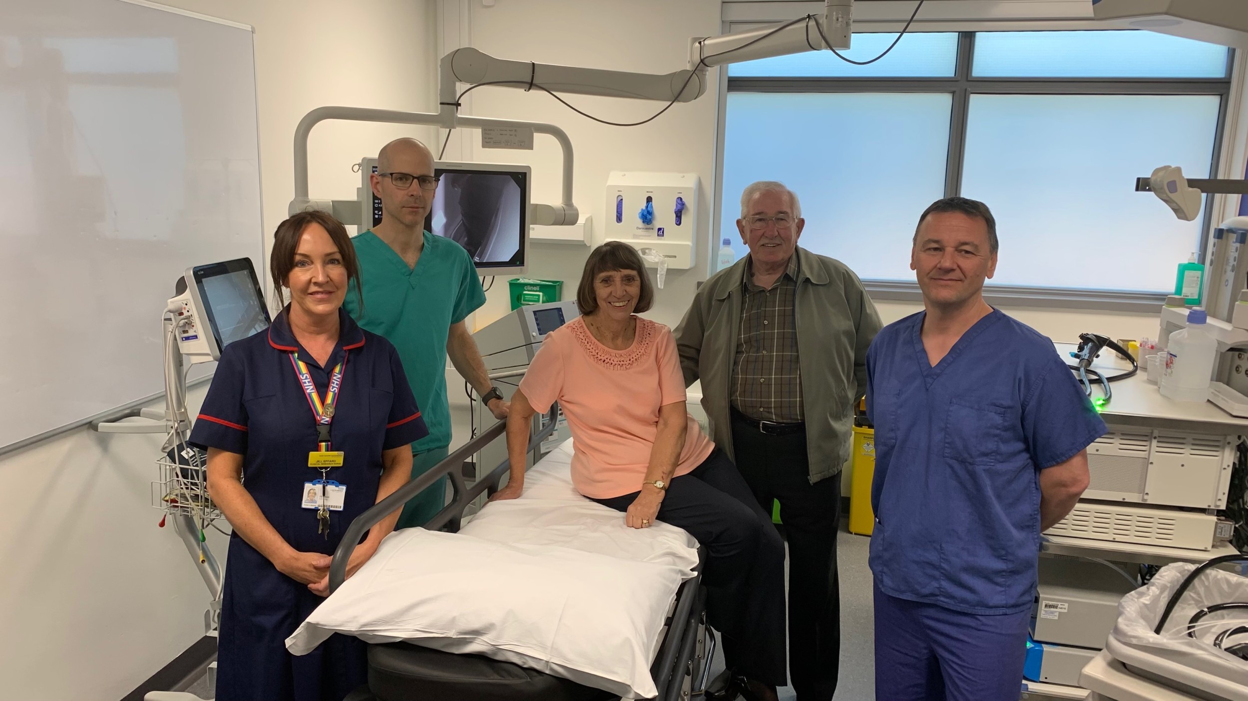 Jean and Derek Tyler with Research Nurse Jill Effrard,  Research Fellow Dr Alexander Seager and Constulrant Prof Colin Rees..png